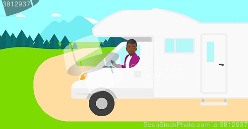 Image of Man driving motor home.