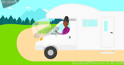 Image of Woman driving motor home.