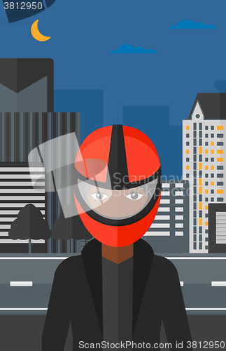 Image of Woman in biker helmet.