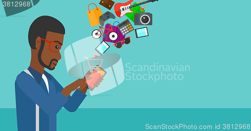 Image of Man making purchases online.
