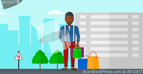 Image of Buyer with shopping bags.