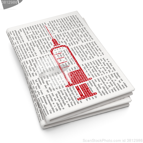 Image of Medicine concept: Syringe on Newspaper background