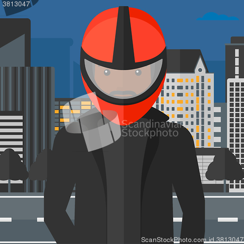 Image of Man in biker helmet.