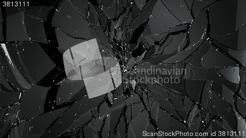 Image of Pieces of Shattered glass on black background