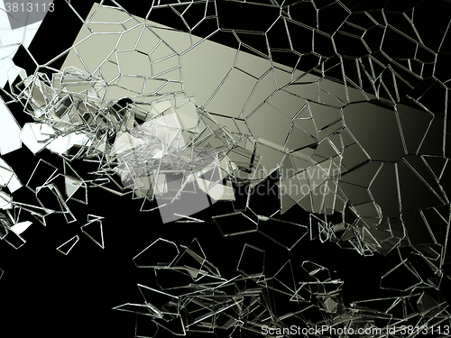 Image of Pieces of splitted or cracked glass on black