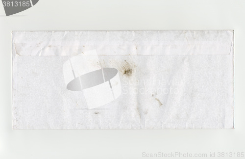 Image of Dirty white letter envelope