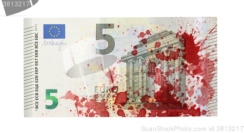 Image of Close-up of a 5 euro bank note, stained with blood