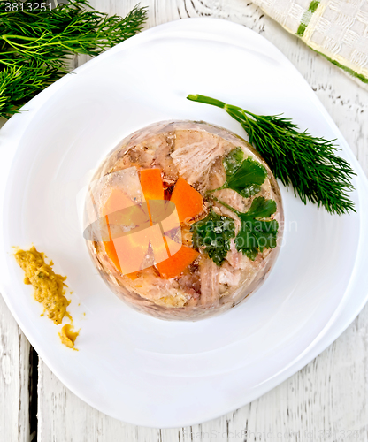 Image of Jellied with mustard in plate on board top