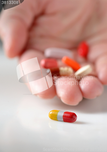 Image of Pills in hand, close-up