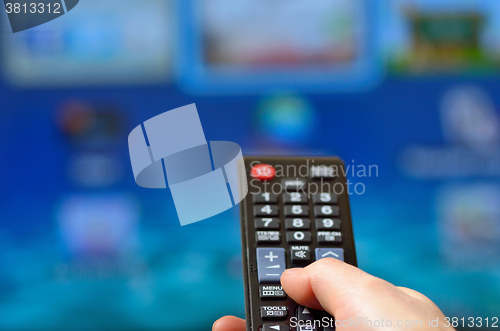 Image of Woman  Holding Remote Control 