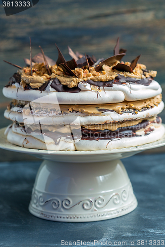 Image of Coffee cake with meringue, hazelnut and chocolate.