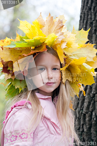 Image of young girl in maple wreath