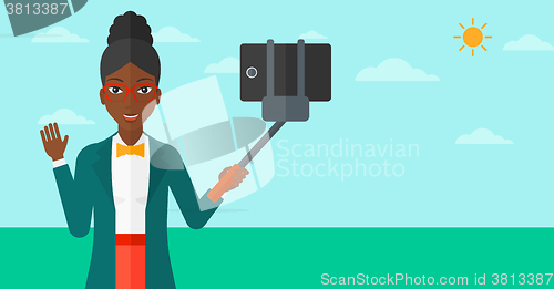 Image of Woman making selfie.