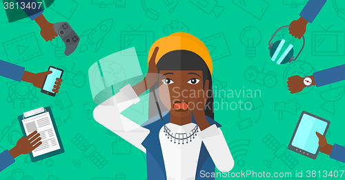 Image of Desperate woman with gadgets.