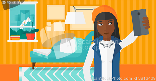 Image of Woman making selfie.