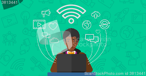 Image of Man working on laptop.