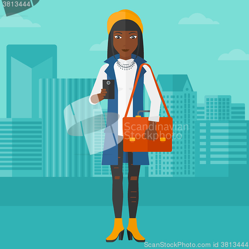 Image of Woman using smartphone.