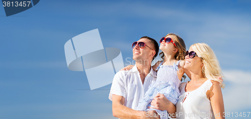 Image of happy family with blue sky