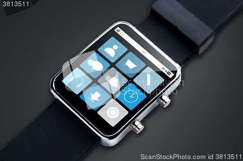 Image of close up of smart watch with menu icons on screen