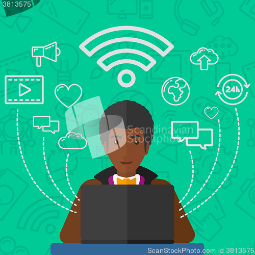 Image of Man working on laptop.