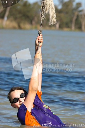Image of girl hanging