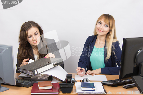 Image of The situation in the office - one employee can handle the job, the other is not