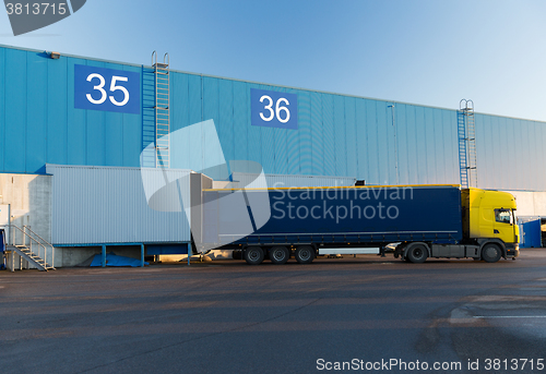 Image of warehouse gates and truck loading