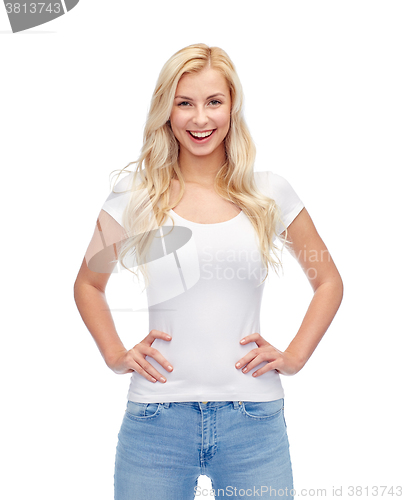 Image of happy young woman or teenage girl in white t-shirt