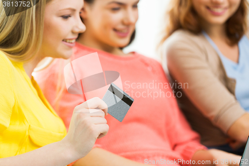 Image of close up of women or friends with credit card