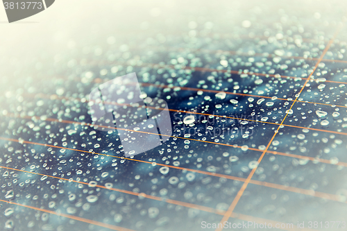 Image of close up of wet rear car glass