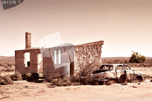Image of old car and ruins