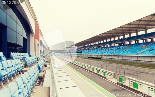 Image of empty speedway and bleachers on stadium