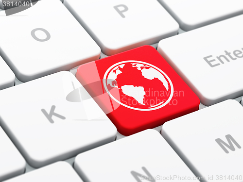 Image of Education concept: Globe on computer keyboard background