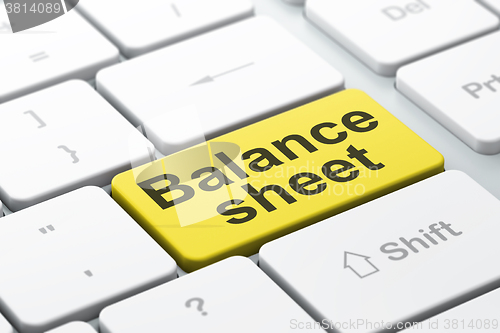 Image of Currency concept: Balance Sheet on computer keyboard background