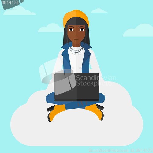 Image of Woman working on laptop.