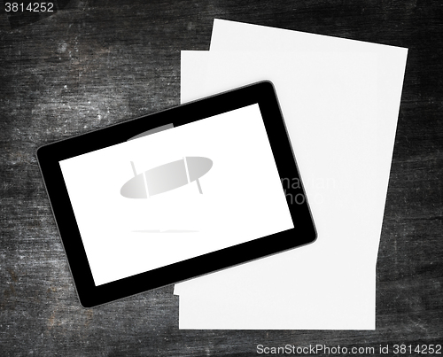 Image of Tablet touch computer gadget on wooden table