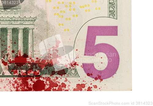 Image of US five Dollar bill, close up, blood