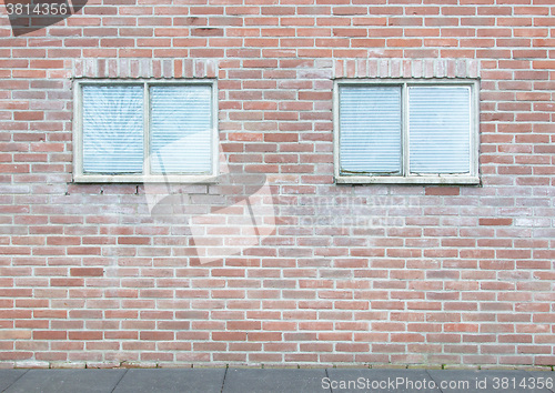 Image of Old vintage brick wall with windows