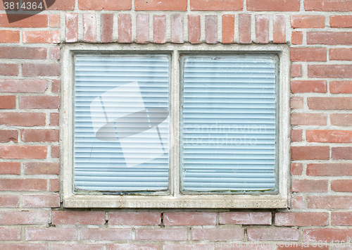 Image of Old vintage brick wall with window