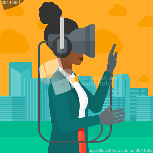 Image of Woman wearing virtual reality headset.