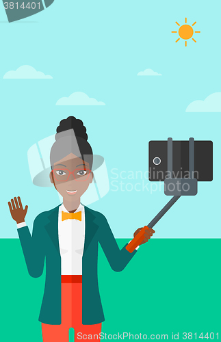 Image of Woman making selfie.