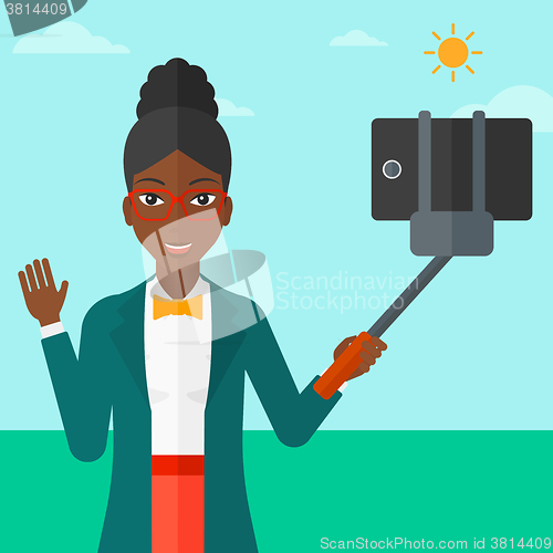 Image of Woman making selfie.