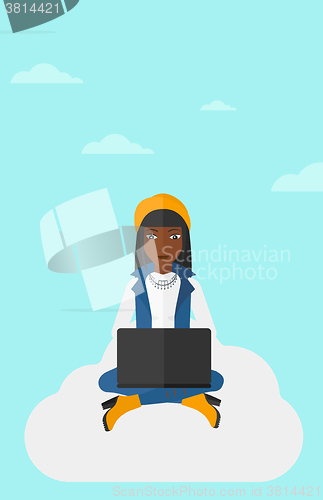 Image of Woman working on laptop.