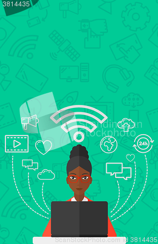 Image of Woman working on laptop.