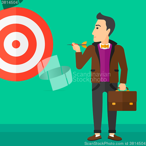 Image of Businessman with target board.