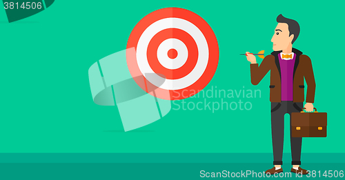 Image of Businessman with target board.