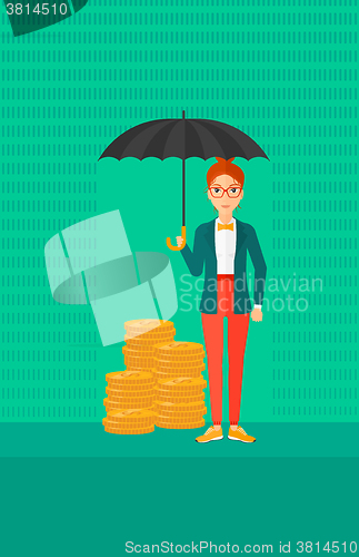 Image of Woman with umbrella protecting money.