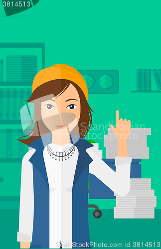 Image of Business woman pointing up with her forefinger.