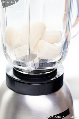 Image of close up of blender shaker with bananas