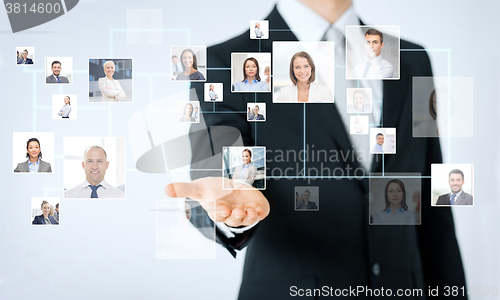 Image of close up of man hand showing business contacts